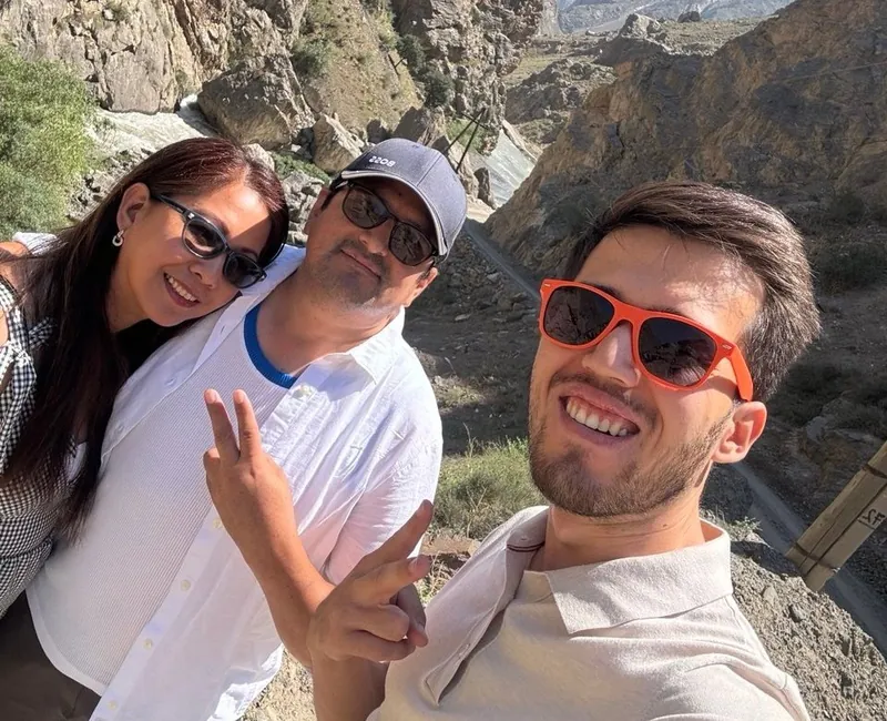 Our guide with two guests in the Fann Mountains, Tajikistan