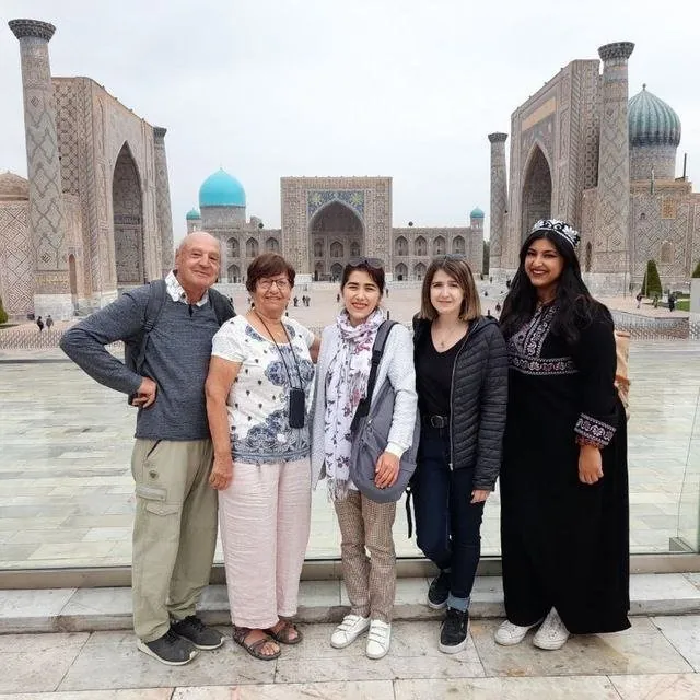 Our guide Makhfuza with guests at Registan Square, Samarkand